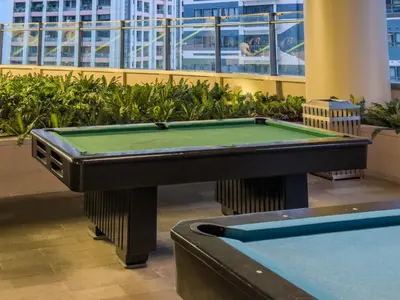 a pool table in the middle of a building at Home with Best Sunset of Manila Bay and Sea view! in Manila