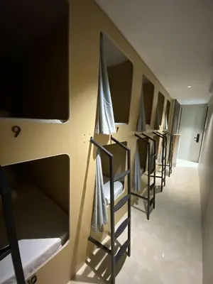 a row of bunk beds in a room at BuenaSentro Hostel in Manila