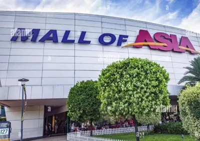 a mall of asia sign on the side of a building at Legit Staycation walking distance to Mall of Asia located in Shore1 and 2 Residences in Manila