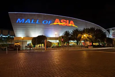 a mall of asia building with a sign on it at Shore 3 Residences Spacious & Spotless 1BR unit near airport MOA SMX in Manila