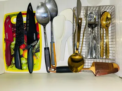 a tray full of utensils on a counter at Rhome Staycation by Azure St Tropez Tower Beach View Condo Unit in Manila