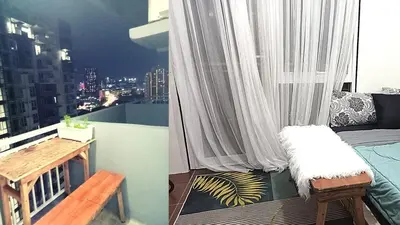 a balcony with a bench and a window with a view at Condo Free Pool Fast Wi-fi near BGC, C5 in Manila