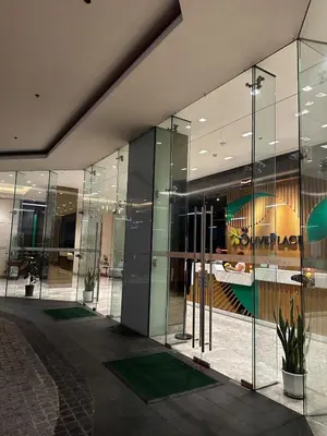 a lobby of a building with glass walls at Casa La Vista in Manila