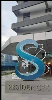 a building with a sign that readsresidents at S Residences Tower 1 Staycation in Manila