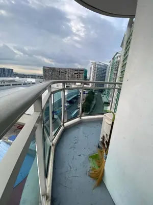 a view from the top of a balcony of a building at azure city view 2bedroom in Manila