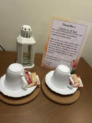 two cups and saucers sitting on top of a table at Casa En El Sur in Santa Rosa