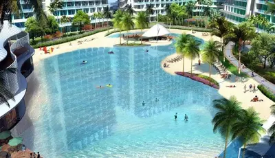 an overhead view of a large swimming pool with people in it at Cee Staycation in the City - Azure Maui Penthouse in Manila