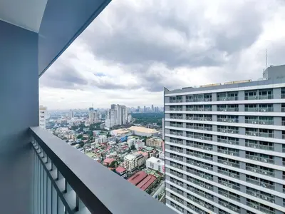 a view of a city from a building at 1BR Condotel with Balcony at FAME Residences #FM16-1 in Manila