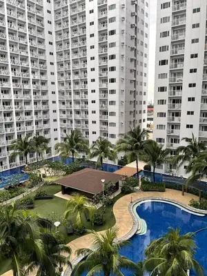 an aerial view of a resort with tall buildings at Shore Residences Haru Cozy pad Near Mall of Asia and Airport in Manila