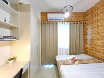 a small room with a bed and a window at 1BR Condotel with Balcony at FAME Residences #FM05-1 in Manila