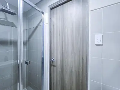 a shower with a shower curtain in a bathroom at 1BR Condotel with Balcony at FAME Residences #FM33-1 in Manila