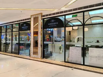 a store front with glass windows in a shopping mall at 1BR Condotel with Balcony at FAME Residences #FM58-1 in Manila