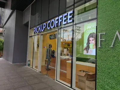 a store front with a sign for a coffee shop at 1BR Condotel with Balcony at FAME Residences #FM60-1 in Manila