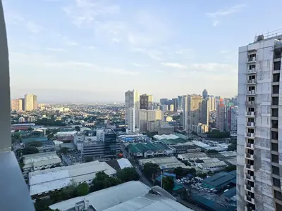 a view of a city with tall buildings at 1BR Condotel with Balcony at FAME Residences #FM61-1 in Manila