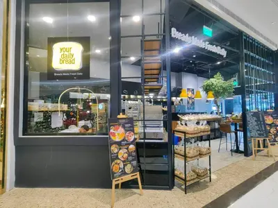 a bakery shop with a display window with bread at 1BR Condotel with Balcony at FAME Residences #FM63-1 in Manila