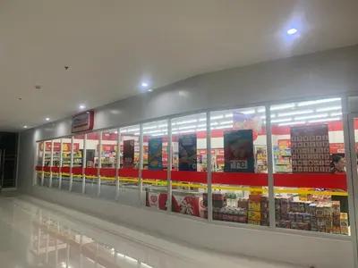 a grocery store aisle with a display of food at 1BR Condotel Ridgewood Towers Near Airport #RW04-1 in Manila