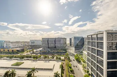 an aerial view of a city with tall buildings at Hotel Like Staycation Near Airport and MOA Porongs Oasis in Manila