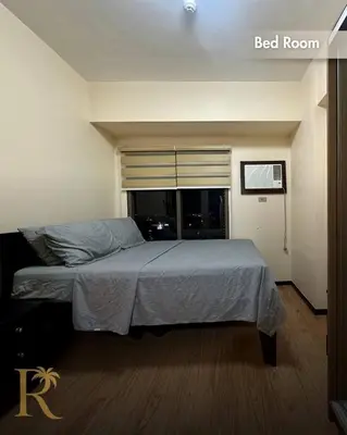 a bed in a bedroom with a bed room at The Radiance Manila Bay - DF Sy 19J in Manila