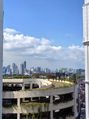 a view of a city from a building at Classy Condotel Across NAIA Terminal 3 in Manila