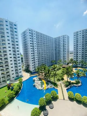 an aerial view of a resort with tall buildings at LiCa Place in Manila