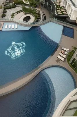 an overhead view of a resort swimming pool at The Spot 43 Sunrise in Makati in Manila
