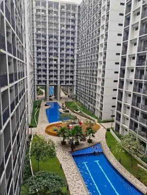 an aerial view of two tall buildings and a pool at Chic City Escape by the Bay in Manila