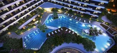 an overhead view of a large swimming pool in a building at Entire Place in Central Makati in Manila