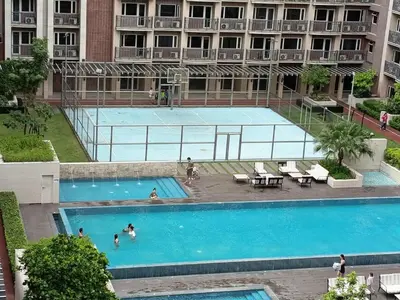 an overhead view of a swimming pool in a building at Condo MOA with pool access WS811 in Manila