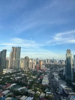 a view of a city with tall buildings at Bright & Cozy 1 BR in Jazz Residences Tower B in Manila