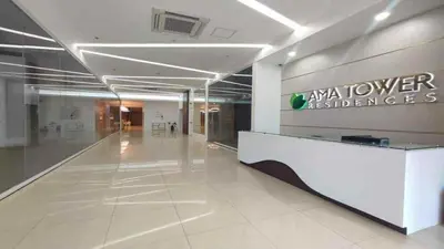 a lobby of an office with a sign on the wall at AMA Tower Residences - Liam Kyro Staycation Place in Manila
