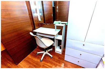 an office with a white desk and a chair at 2 Bedroom Green Yellow luxury 5549 Makati 300Mb swim in Manila