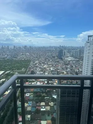 a view of a city from the top of a building at Casa Delantera Karaoke Games Pet Friendly in Manila