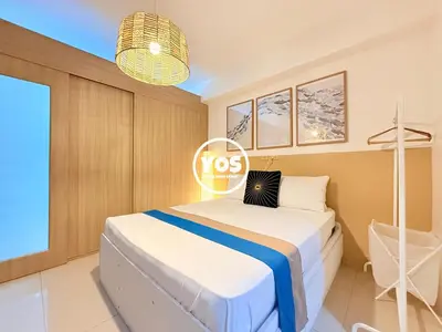 a bedroom with a bed in a room at Your Own Space Staycation in MOA in Manila