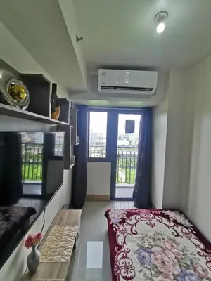 a small room with a bed and a balcony at Mall of Asia condotel shore 3 residence Aldo Staycation in Manila
