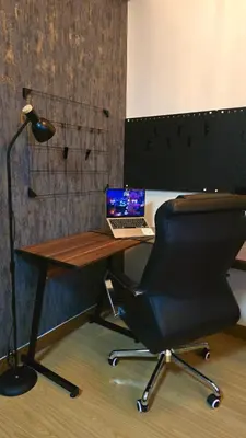 a desk with a laptop computer on top of it at SW Staycation Liam Suite SMDC Hope Residences Beside SM City in Trece Martires