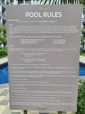 a sign for a show of pool rules at The Donegal with WI-FI Netflix Parking with fee in Manila