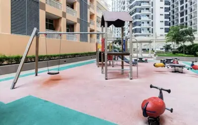 an empty playground with a swing at Classy Venice Grand Studio Balcony Pet friendly, WiFi & Pool in Manila