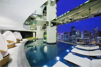 a house with a swimming pool with a city skyline at C-Studio,Best Sunset Pool,Luxury,Hotel Style in Manila