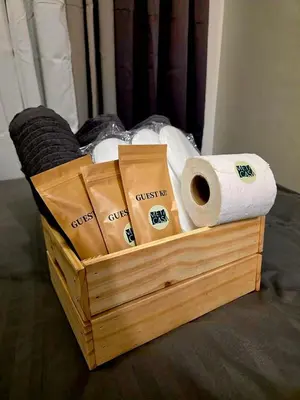 a wooden crate filled with toilet paper and paper towels at MetacasaStaycations-beside EK with Fireworks view in Santa Rosa