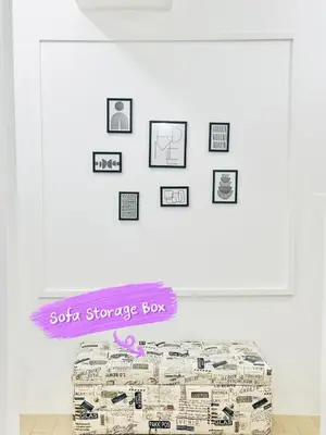 a white room with a couch and pictures on the wall at Chill Luxe Vista in Manila