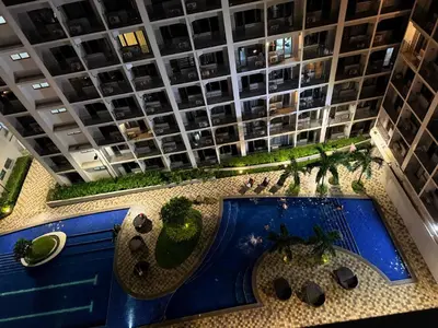an overhead view of a pool in a building at Shore 2 Residences Tower 3 by HappyHaven in Manila