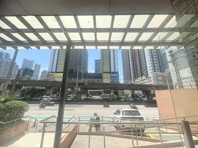 a view of a city with a bridge and buildings at JJMC PLACE 28 With Netflix and Unli Wifi in Manila
