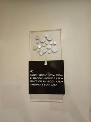 a sign on a wall with pills on it at Luxury apartment at Park McKinley West suite 1 in Manila