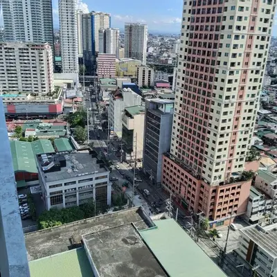 an aerial view of a city with tall buildings at Homefort Twin Bed Suite - Red Residences Unit 2626 in Manila