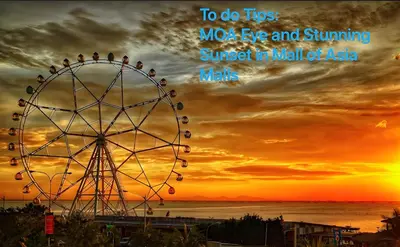 a ferris wheel with a sunset in the background at Luxury 2BR Condo Retreat Near Airports MOA Okada in Manila