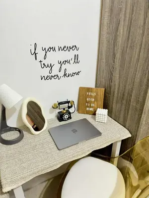 a desk with a laptop computer on top of it at Staycation near MOA Pasay at Shore Residences - Elizcape in Manila