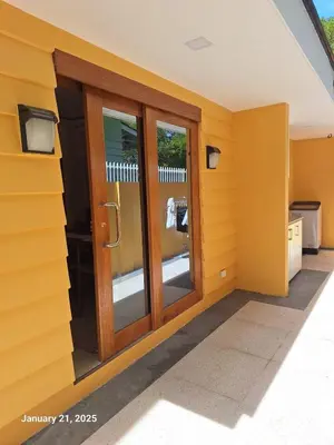 a front door of a house at Brand New Home! 3BR, 5 Beds, 3 Baths, Full AC in San Agustin