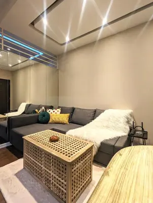 a living room with a couch and a table at BBricks Alabang Beside Festival Mall in Manila