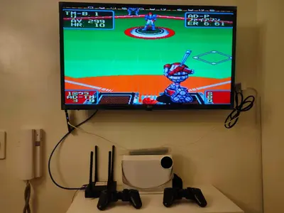 a flat screen tv hanging on a wall with a video game at Staycation near MOA, SMX Convention, DFA & NAIA, in Manila