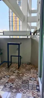 a table in a room with a tile floor at Close by landmarks and airport in Manila